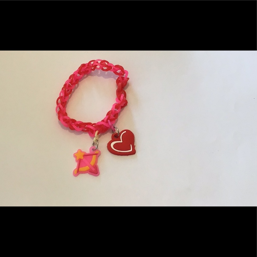 Rainbow loom rubber band bracelet with heart and arrow charm